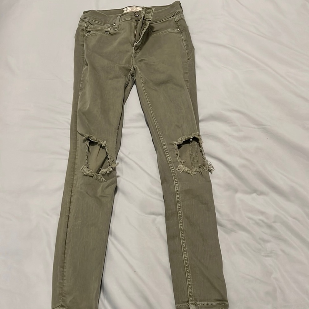 Free people green bust knee jeans